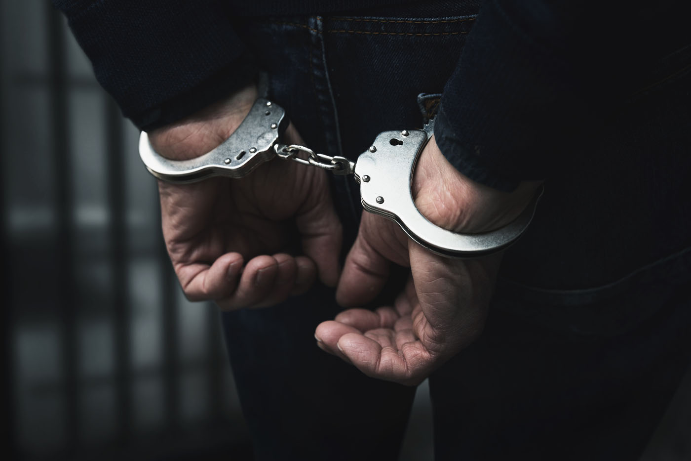 An image of a police officer holding a breathalyzer after using it on a driver — For an expereinced drug lawyer in Utah, contact Branson West Law.