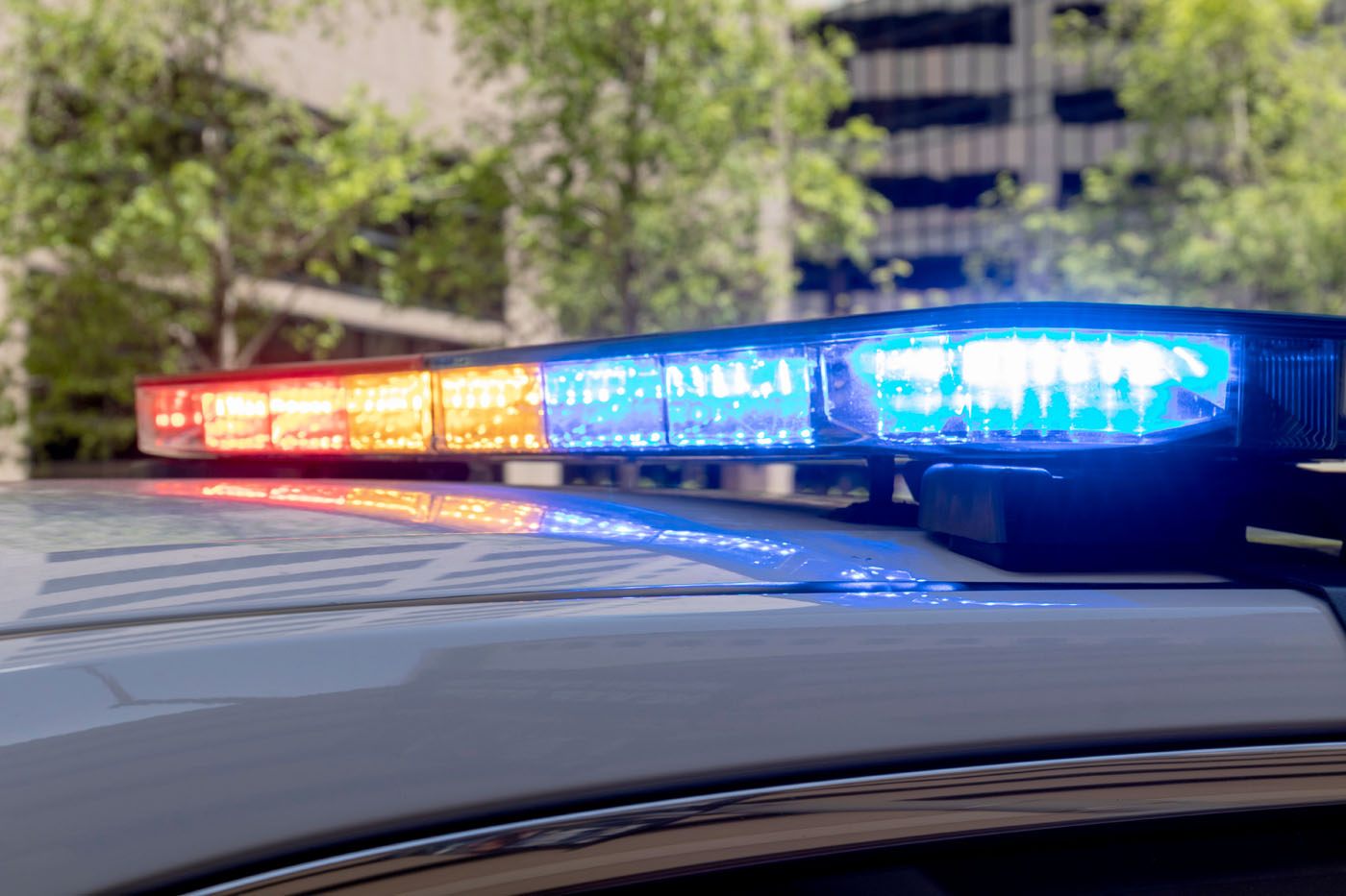 An closeup image of cop car lights - if you need a defense for your violent crime, hire Branson West Law, a qulalified and experienced violent crimes lawyer in Utah.