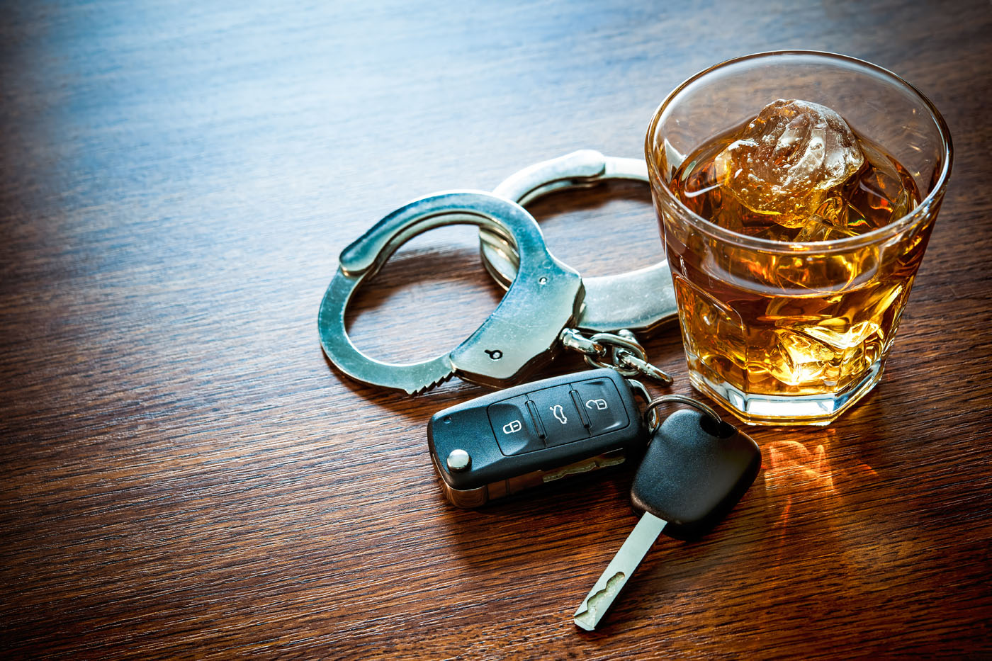 A drink and a pair of car keys from a DUI case - contact Branson West Law today for an expert DUI defense attorney in Utah.