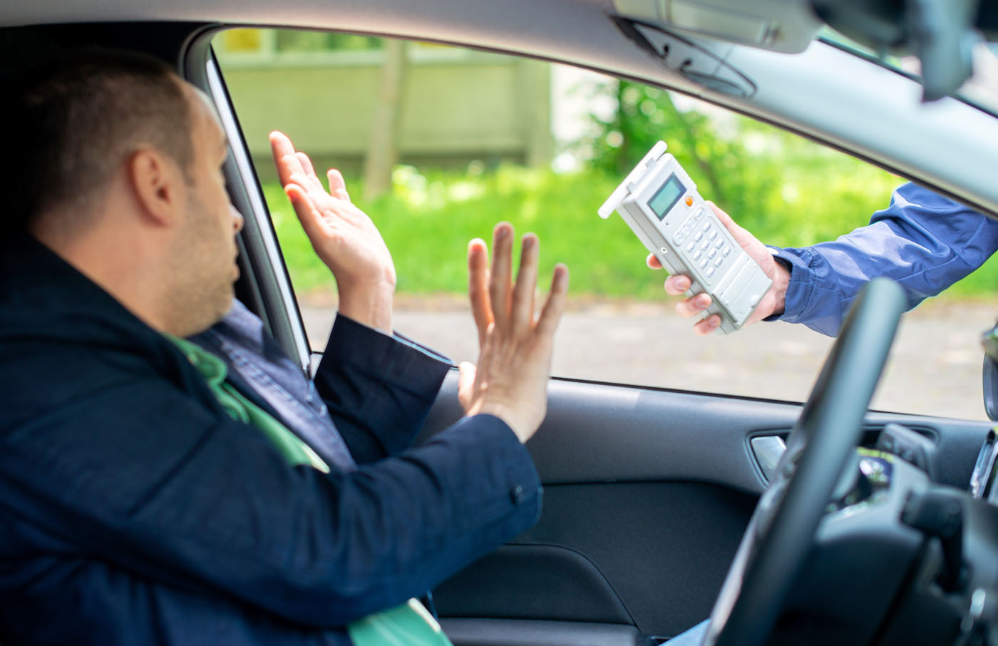 A man panicking at his car window in Utah.
