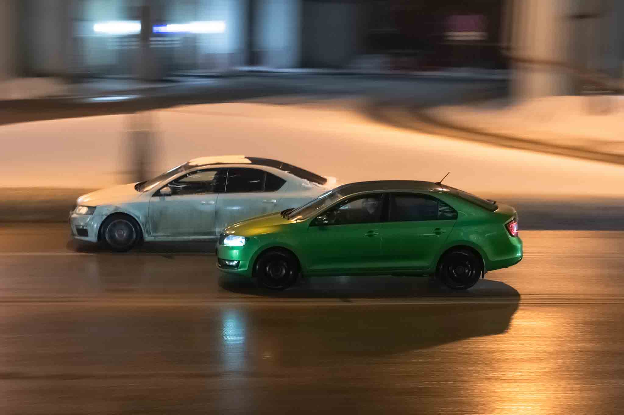 Two cars racing in the street, choose Branson West Law as your exhibition of speed defense lawyer in Utah.