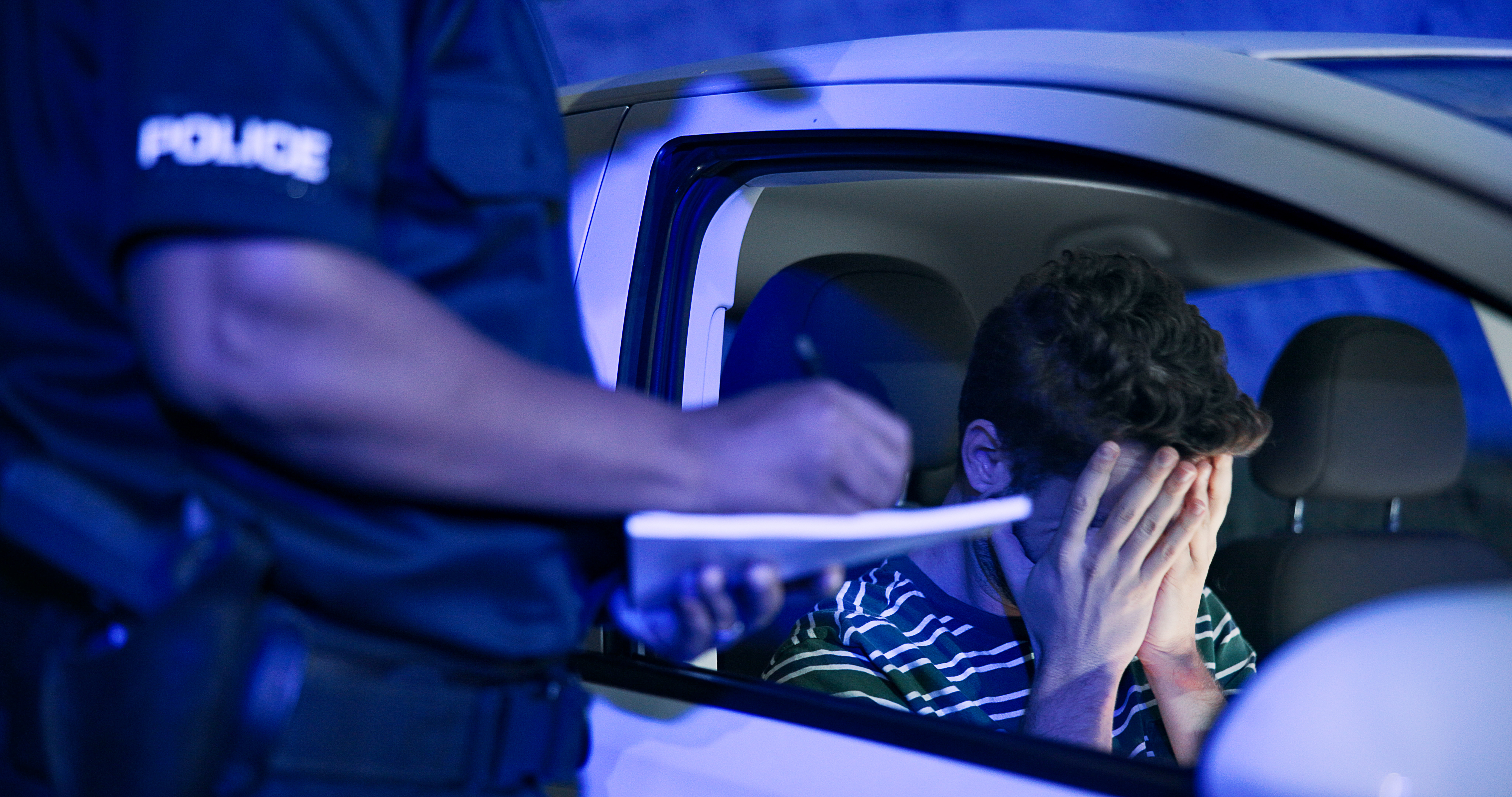 A young driver being pulled over for underage drunk driving charges in Utah - contact Branson West Law for help today!